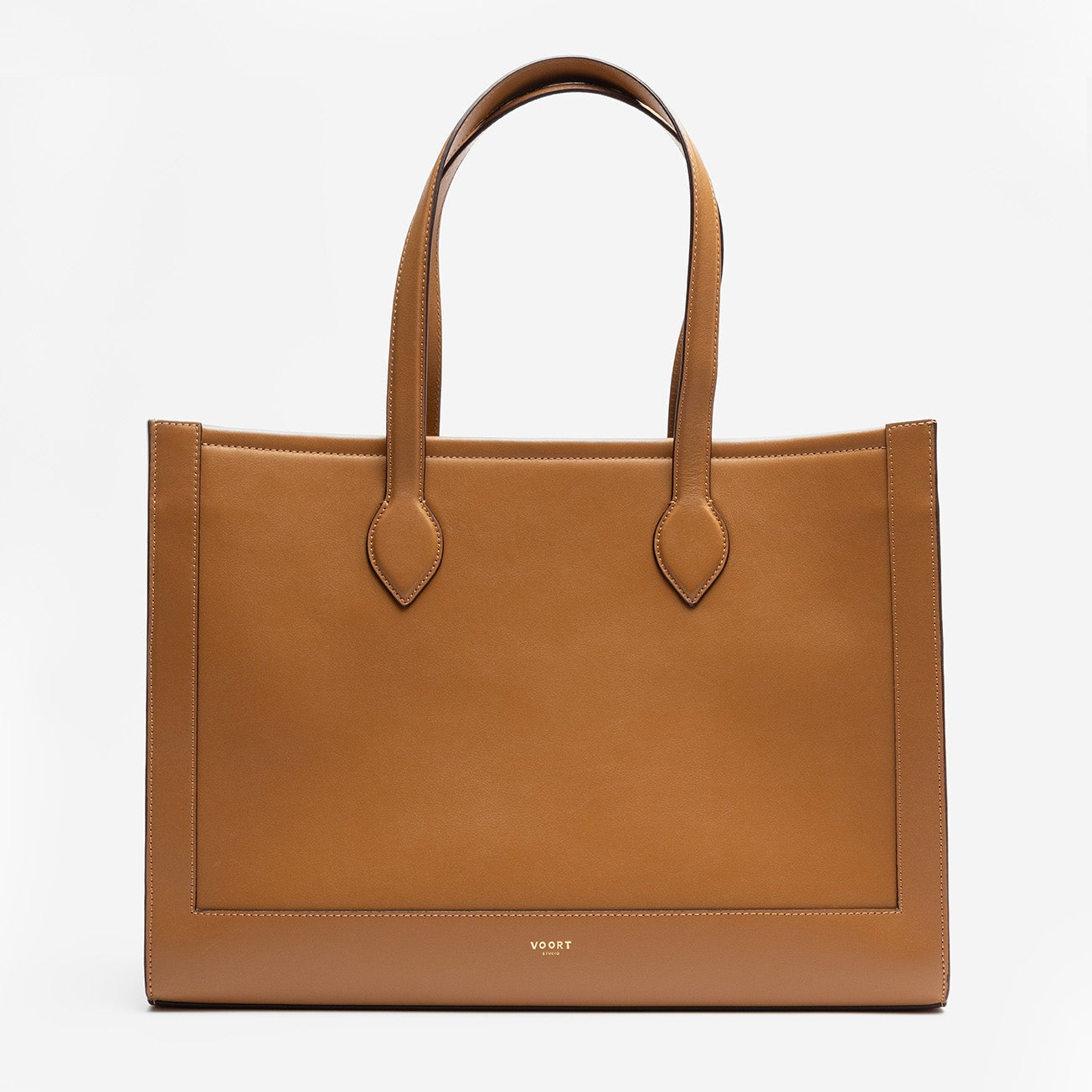 Shoulder bag, leather with minimal detail. Caramelle, Brown color. Fits 16' laptop